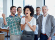 © ArcursPI/peopleimages.com - Diversity team, portrait or happiness in office for success, support or celebration of promotion. Female leader, project manager or creative group in city for pride, well done or excited for victory