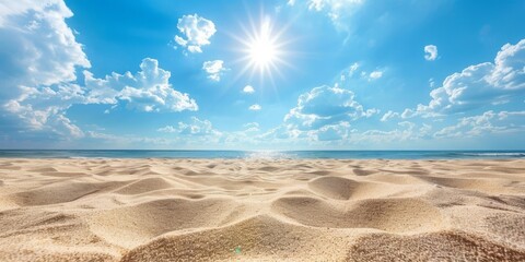 Close-up of beach sand against the background of the sea on a sunny bright summer day