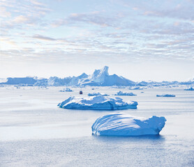 Antarctica, frost and water with ice in ocean for cold ecosystem of environment in winter season. Earth, frozen and sky with iceberg in sea for conservation of ecology in mother nature location