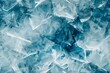 A composition of transparent geometric shapes with a frosty, icy texture and blue and white tones.