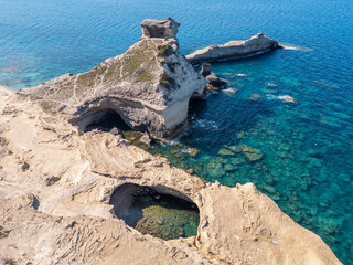 Sticker - Aerial view of Grotte de Saint Antoine and Capo Pertusato on the Mediterranean coast near Bonifacio on the south coast of the island of Corsica