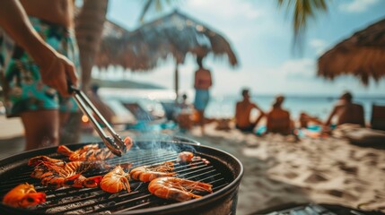 Close-up of hands with tongs grilling fresh seafood on the beach with group of people enjoying outdoor party at summer.