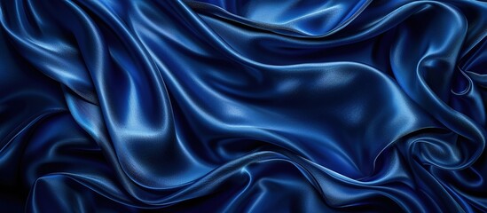 A background made of wavy strands of blue satin fabric