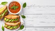© JP STUDIO LAB - High-resolution image of vegan avocado sandwiches and soup, elegantly presented on a white wooden background with ample copy space, focus cover all object, deep dept of field