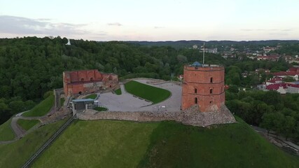 Poster - Gediminas Castle in Vilnius Old Town in Lithuania. Hill of Three Crosses in Background. Cityscape. Landscape.