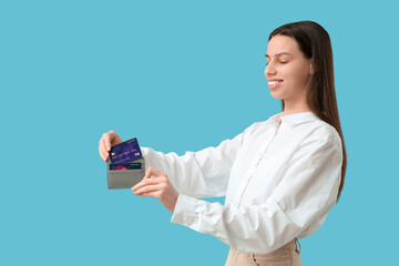 Sticker - Woman with credit card holder on blue background