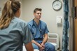 © Jane_S - Two healthcare professionals discussing patient care next to medical equipment in a hospital.