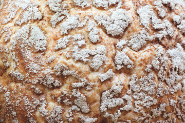 Poster - A close up of a pastry with a lot of powdered sugar on it. Concept of indulgence and sweetness, as the powdered sugar adds a layer of texture and flavor to the pastry