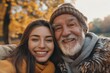 © Jane_S - Selfie of a grandfather and granddaughter in autumn park.