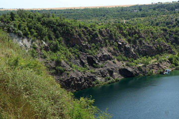 Rocky shore of a lake in the mountains