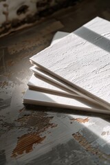 Aufkleber - Stack of papers sitting on a table with a flat surface, ideal for office or study setting