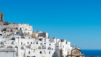 Sticker - Panorama of Ostuni, the white city, with the sea in the background.