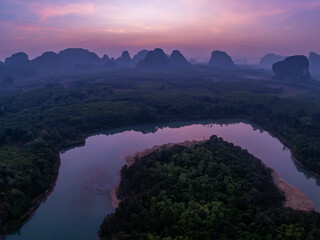 Poster - Landscape Aerial view of majestic clouds in the sky sunset or sunrise over sea with reflection in the tropical sea.Beautiful landscape scenery.Amazing light of nature Landscape nature background