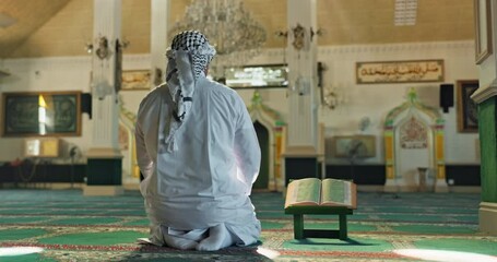 Wall Mural - Muslim, man and prayer or dua in mosque for religious worship, spiritual faith or gratitude in praise. Back, islamic person or kneeling in holy temple and praying to Allah for Palestine in solidarity