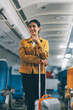 © ARMMY PICCA - Young Female Tourist with Luggage Walking Through Airplane Cabin Ready for Travel Adventure