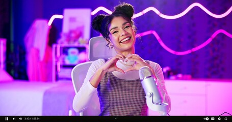 Poster - Streamer, portrait and woman with microphone, heart hands and neon light and happy influencer in home studio. Love, emoji and content creator girl in video live stream for like, subscribe and follow