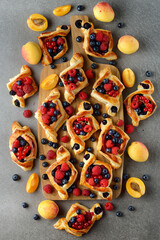 Wall Mural - Homemade puff pastry pies with fruit