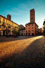 Wall Mural - Old town square and medieval towers in Alba, italy.