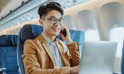 Canvas Print - A young businessman is working on his laptop and talking on the phone while flying on a plane. AI.