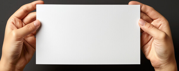 Poster - A hand holding a blank piece of paper. The paper is white and has no writing on it