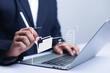 © ภัทรชัย รัตนชัยวงค์ - Businessman working on laptop computer documents, managing, files, data, folders, share, digital, information, electronic document management, database, online documents, paperless office concept