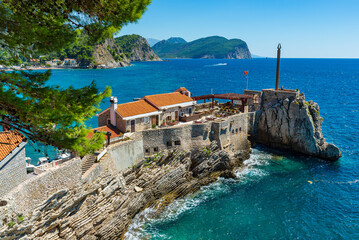  View of the rocky cape in the resort town of Petrovac, Castello Venetian fortress from the XVI century.