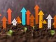 © wanavit - Colorful arrows rising from the soil, representing growth, success, and progress in business and personal development concepts.