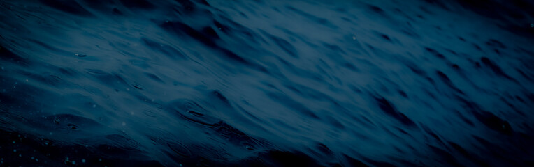 Wall Mural - blue sea water surface texture background with ripples