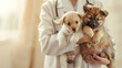 © sornram - Veterinarian holding two adorable puppies, providing a loving and caring environment at the animal clinic, emphasizing pet health and safety.