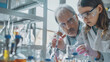 © VK Studio - An elderly scientist mentors a young girl in a laboratory, focusing on pipetting, underscoring the importance of education and intergenerational knowledge transfer.