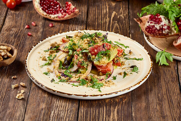 Wall Mural - Traditional Georgian Salad with Tomatoes, Cucumbers, and Walnuts - Authentic Caucasus Cuisine