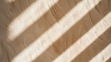 Sticker - Close up of a textured wall with light and shadow patterns contemporary architecture warm beige tones 