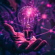 © artemstepanov - Businessman holding neon light bulb, purple lamp in hands, new ideas, great inspiration, energy, innovation