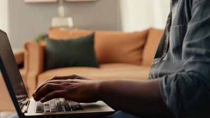 Poster - African American Man Working on Laptop in Cozy Living Room Generative AI