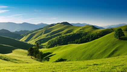 Canvas Print - serene landscape with rolling green hills under a clear blue sky perfect for nature and outdoor themes