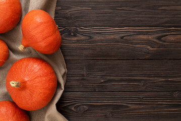 Wall Mural - Hokkaido Pumpkins, also known as Red Kuri Squash, Arranged as a Border