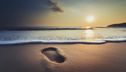 Poster - foot print on the beach on sunrise sea background with vintage filter