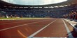 © lacindex - Wide-angle view of an Olympic running track in Paris stadium during the games, with spectators in the background