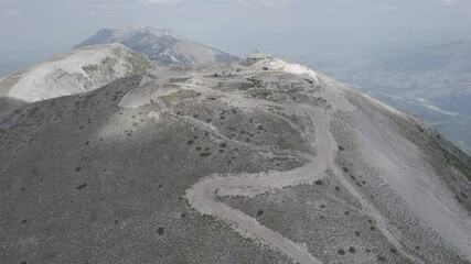 Wall Mural - Aerial view of Mount Tomorr is situated within the Tomorr National Park with Shrine (tyrbe) of Abbas ibn Ali on the top in Summer, Albania - raw file