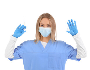 Canvas Print - Female nurse with ampule and syringe on white background. Vaccination concept