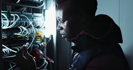 Sticker - Power, electrician and black man with networking in server room, update and engineering. Professional, employee and African male person as technician for connection to cables for maintenance