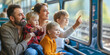 © Andres Mejia - Happy family traveling by train and looking through window