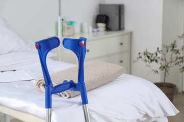 Canvas Print - Crutches near bed in hospital ward, closeup