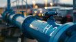 © sornram - Close-up of a blue hydrogen gas pipeline infrastructure with H2 label, showcasing sustainable clean energy in an industrial setting.