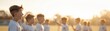 © KanitChurem - Group of young boys playing soccer on a sunny day, highlighting teamwork, joy, and sportsmanship in a vibrant outdoor setting