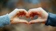 © savittree - Two hands creating a heart symbol, representing unity and affection