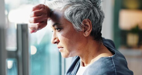 Poster - Woman, doctor and stress with thinking by window for deadline, healthcare burnout and fatigue in hospital. Mature medic, mental health and tired with depressed thoughts, patient death and overworked