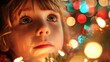 © Artyom - Caucasian child gazing at colorful holiday lights with wonder