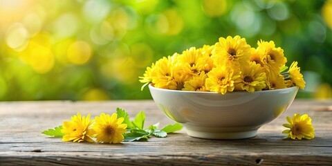 Canvas Print - Yellow flowers in a bowl with a natural background, yellow, flowers, bowl, nature, background, bright, vibrant, colorful