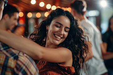 Wall Mural - a woman is dancing at a party with friends